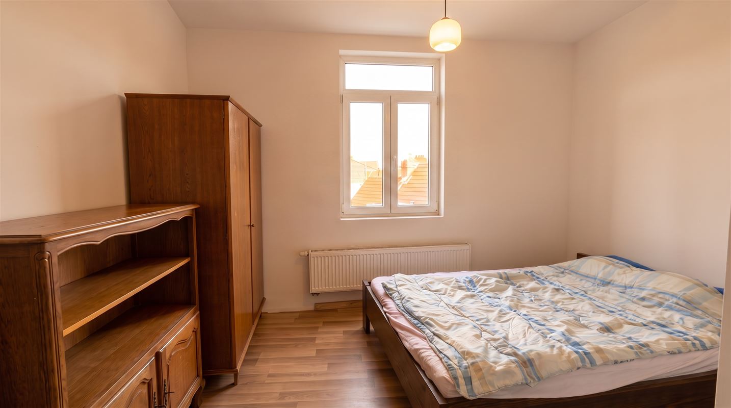 Rendabele opbrengsteigendom met 3 appartementen en handel.