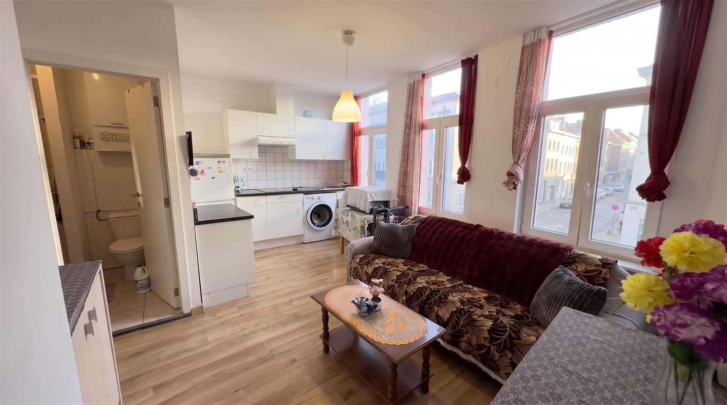 Rendabele opbrengsteigendom met 3 appartementen en handel.