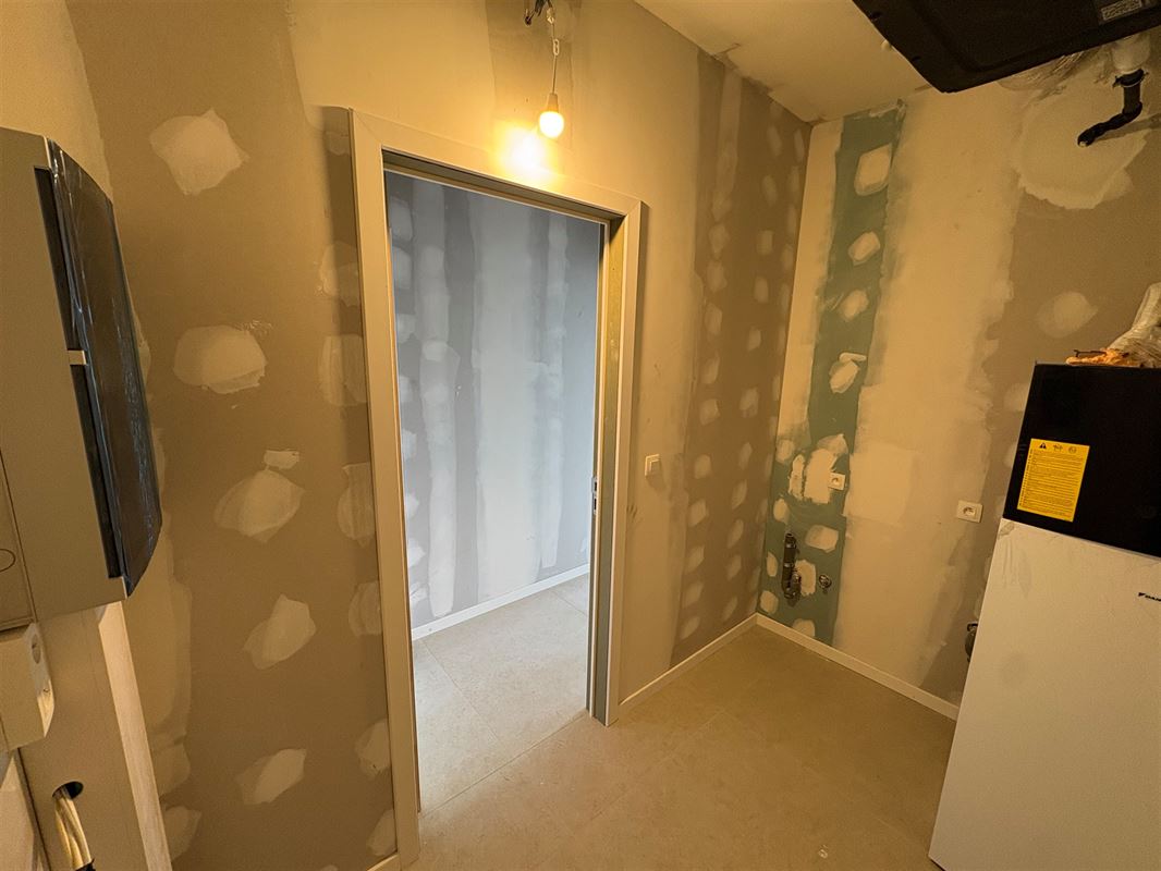 Nieuwbouwappartement met 2 slaapkamers en grote tuin.