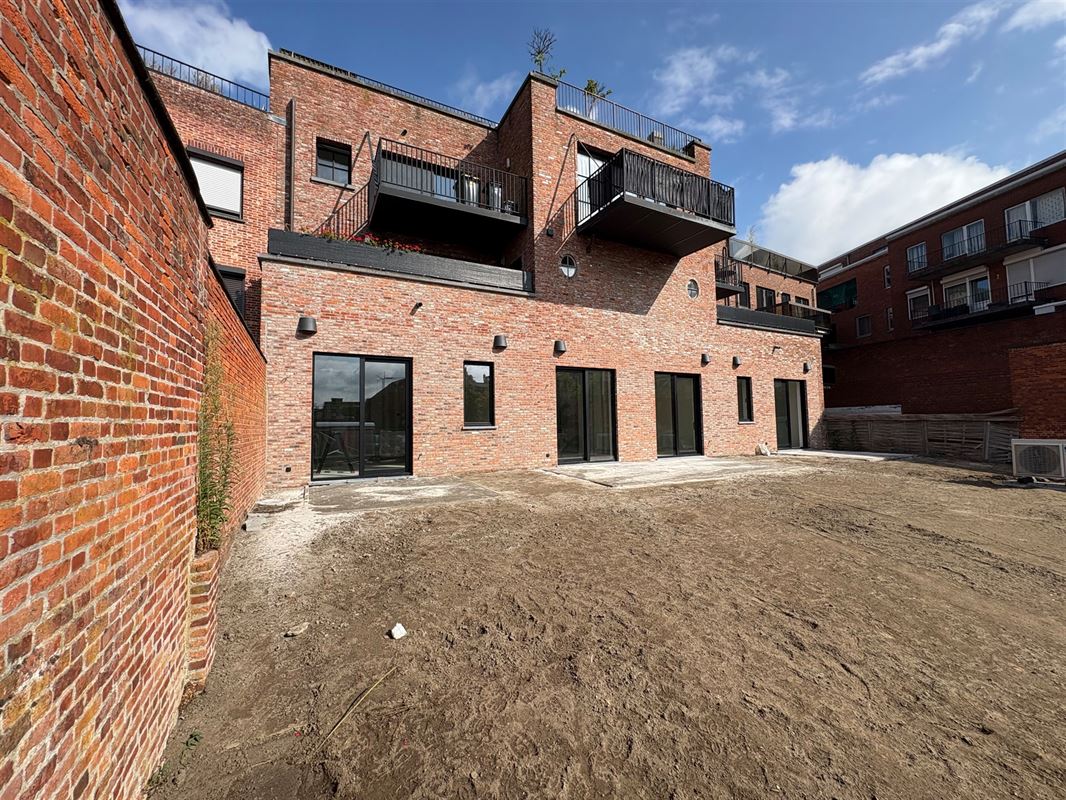 Nieuwbouwappartement met 1 slaapkamer en grote tuin.
