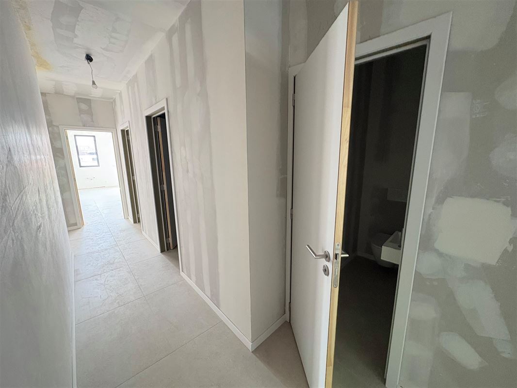 Nieuwbouwappartement met 1 slaapkamer en grote tuin.