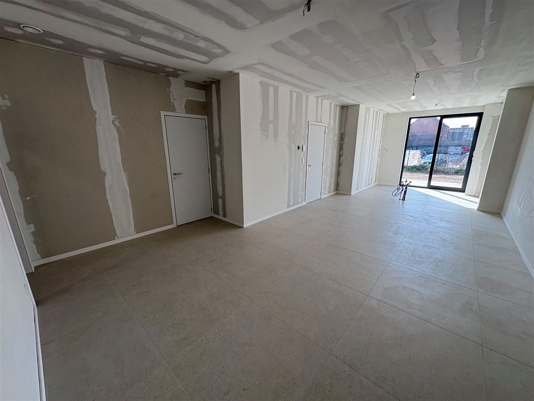 Nieuwbouwappartement met 1 slaapkamer en extra grote tuin.
