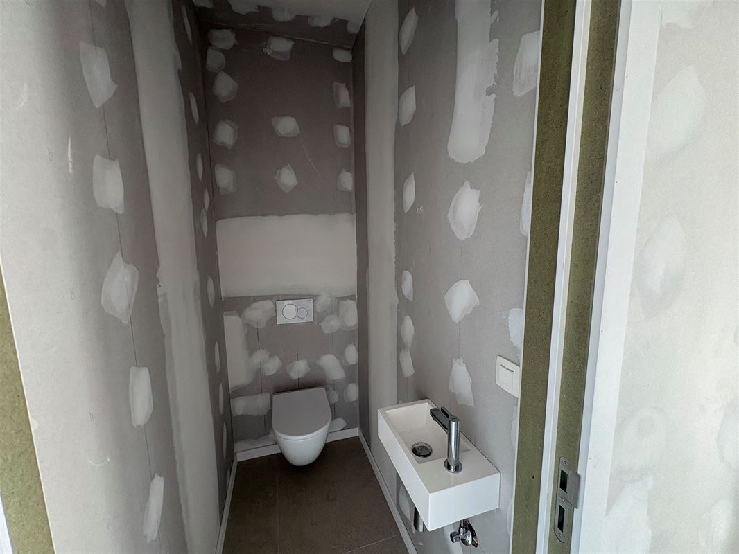Nieuwbouwappartement met 1 slaapkamer en extra grote tuin.