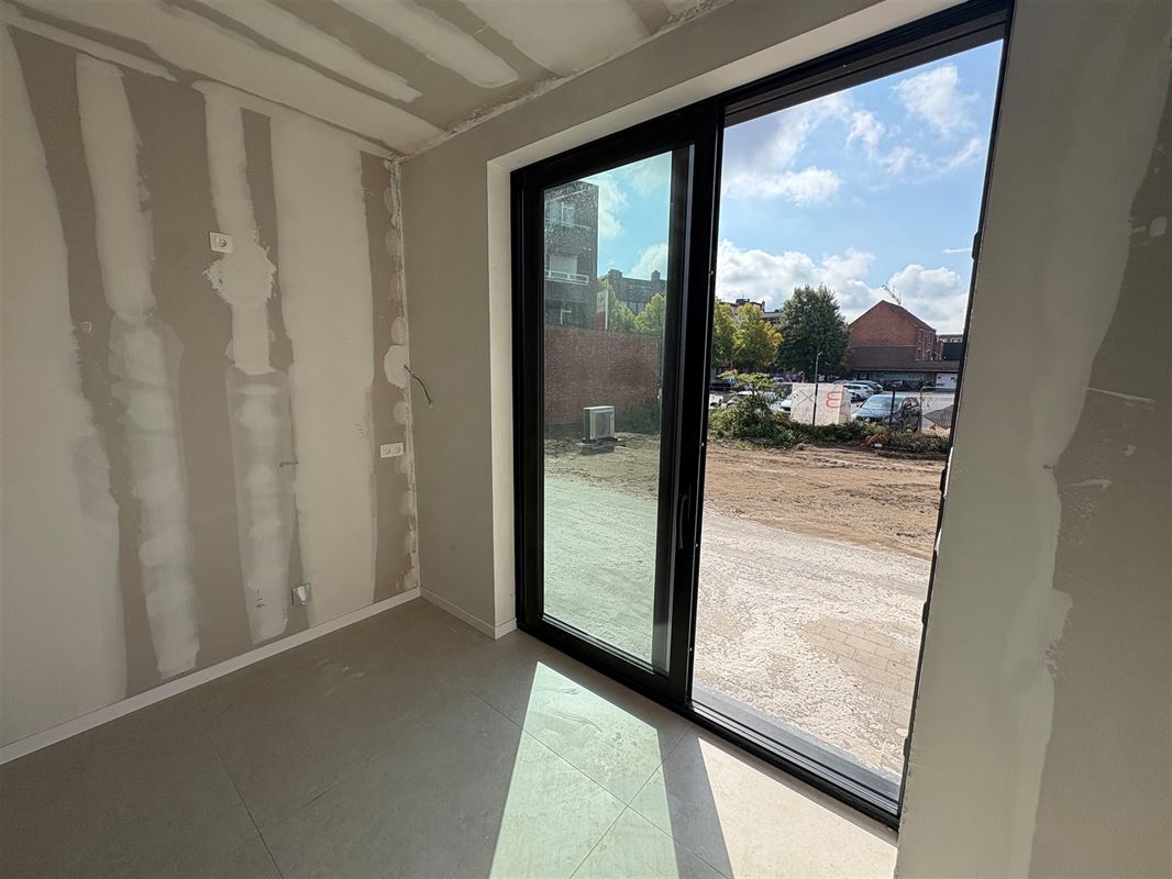 Nieuwbouwappartement met 1 slaapkamer en extra grote tuin.