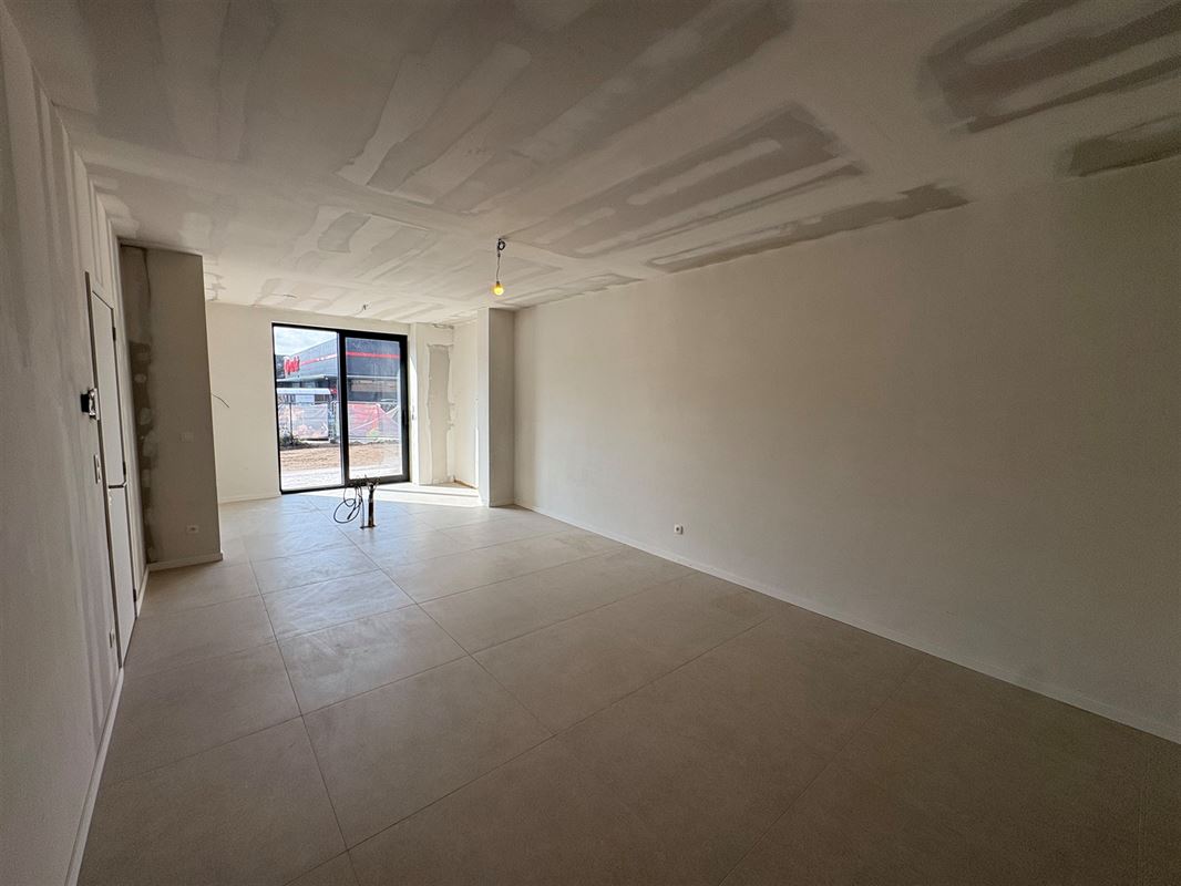 Nieuwbouwappartement met 1 slaapkamer en extra grote tuin.