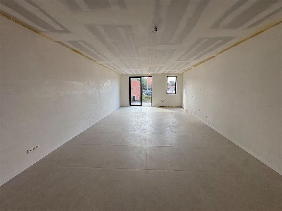 Nieuwbouwappartement met 2 slaapkamers en grote tuin.