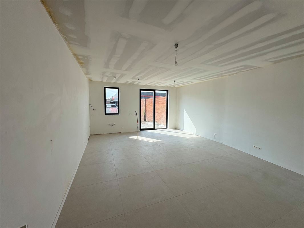 Nieuwbouwappartement met 1 slaapkamer en grote tuin.