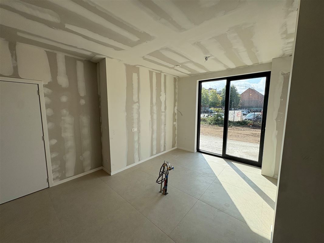Nieuwbouwappartement met 1 slaapkamer en extra grote tuin.