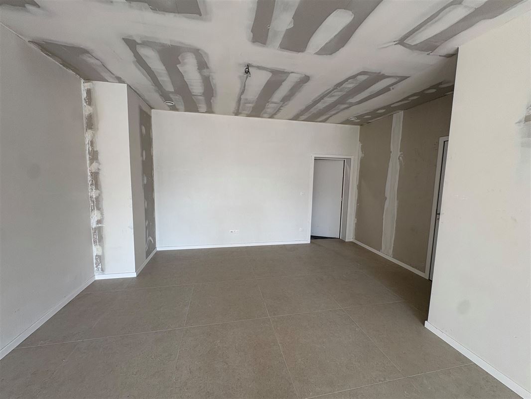 Nieuwbouwappartement met 1 slaapkamer en extra grote tuin.