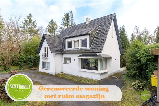Gerenoveerde karaktervolle woning met magazijn (130m2) op een ruim perceel van 3.662m2 in Mol-Rauw.