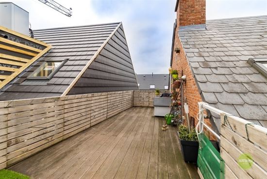 Ruim duplex-appartement  van 120 m2 met 2 slaapkamers en een terras van 30 m2.