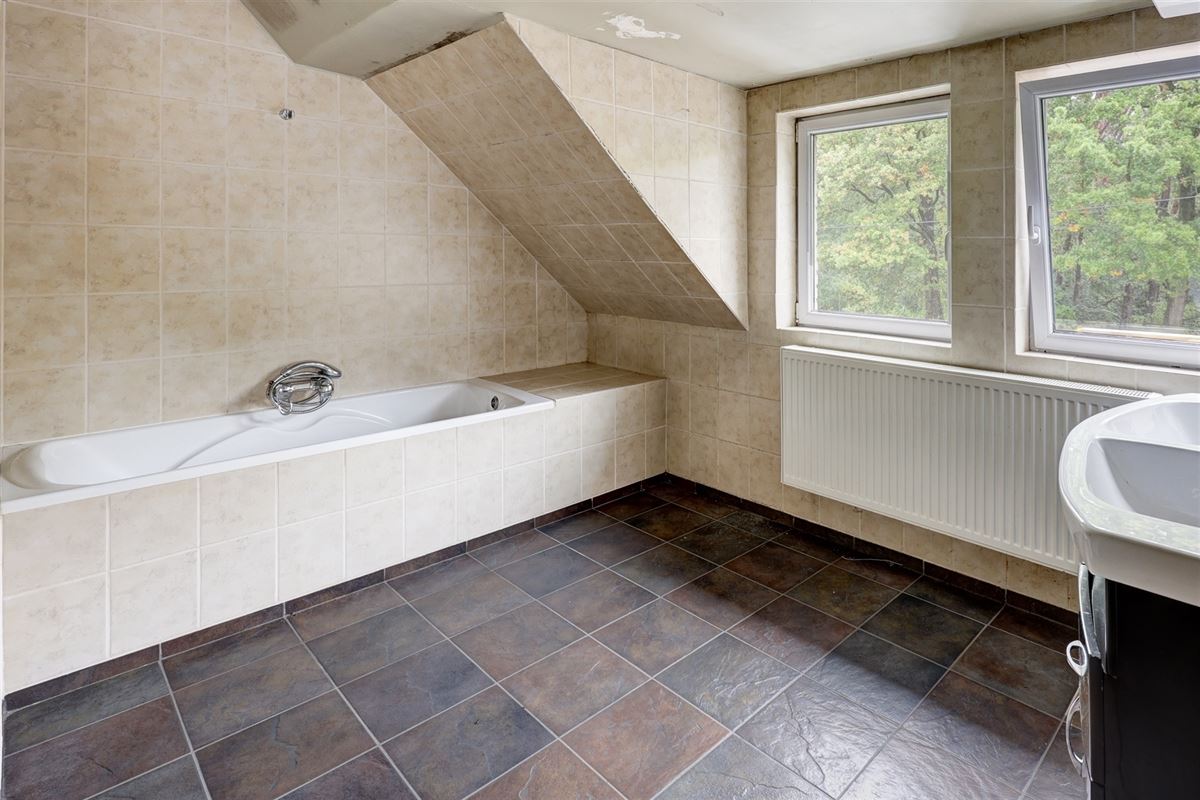 Unieke woning met handelsruimte, ruime stockage en renovatiepotentieel