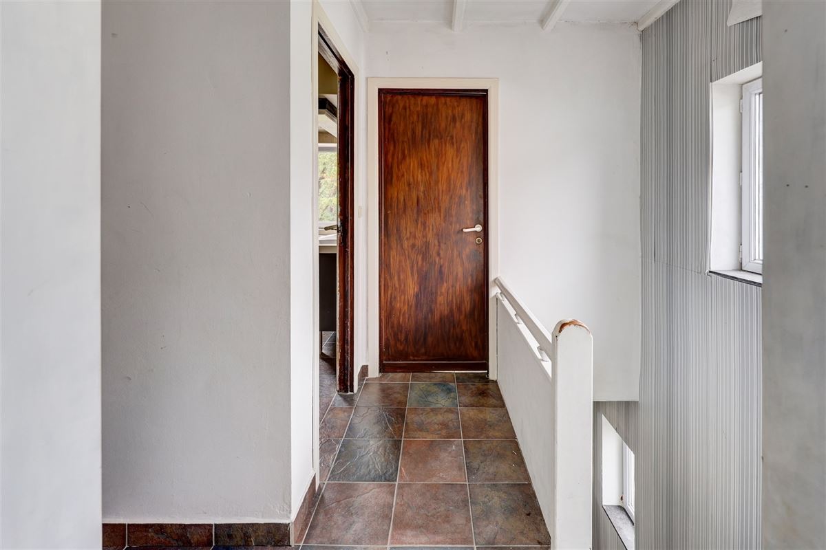 Unieke woning met handelsruimte, ruime stockage en renovatiepotentieel
