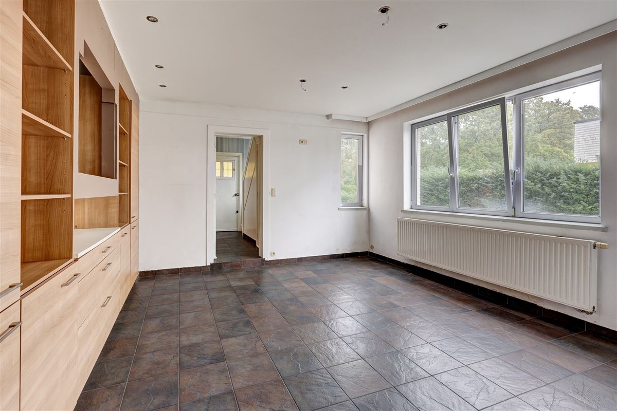 Unieke woning met handelsruimte, ruime stockage en renovatiepotentieel