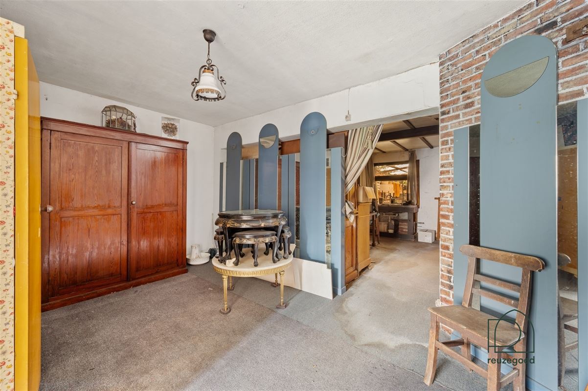 Te renoveren huis (tweewoonst)  met mogelijkheid tot 2 bouwgronden