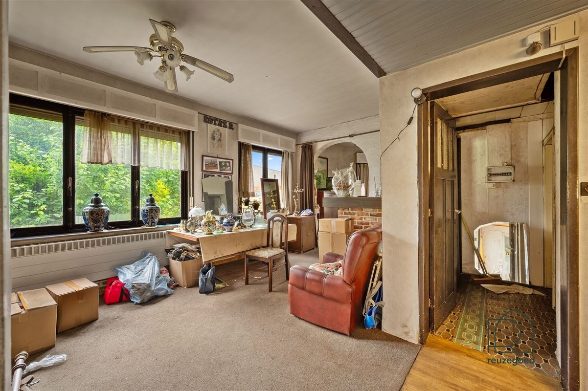 Te renoveren huis (tweewoonst)  met mogelijkheid tot 2 bouwgronden