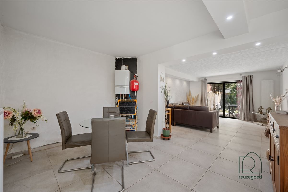 Halfopen bebouwing met bijgebouw en veel potentieel te koop in Bonheiden