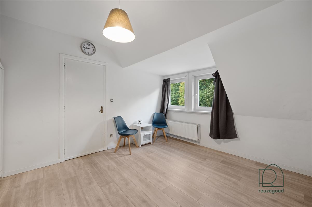 Halfopen bebouwing met bijgebouw en veel potentieel te koop in Bonheiden