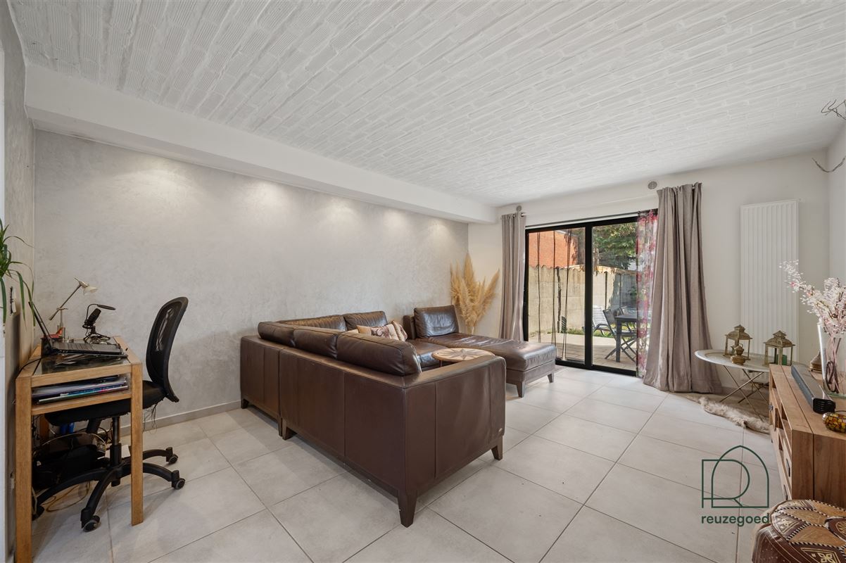 Halfopen bebouwing met bijgebouw en veel potentieel te koop in Bonheiden