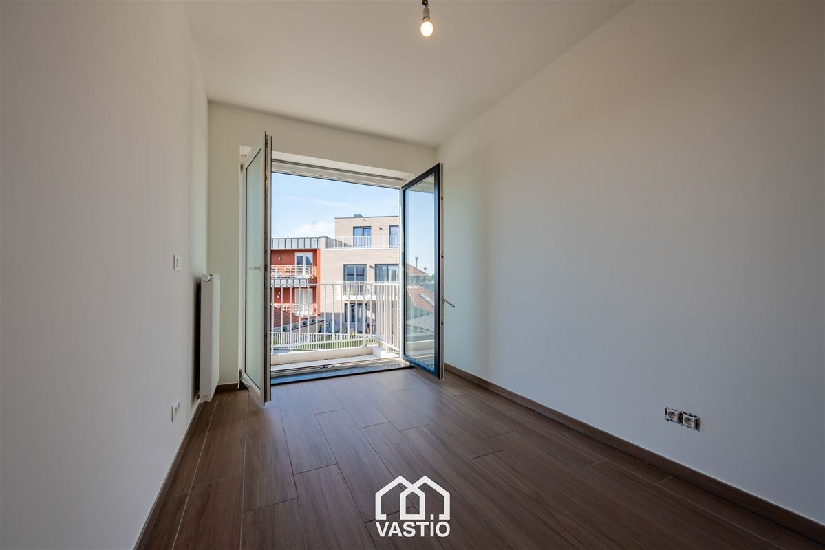 Energiezuinig appartement 2 slaapkamers en parkeerplaats.