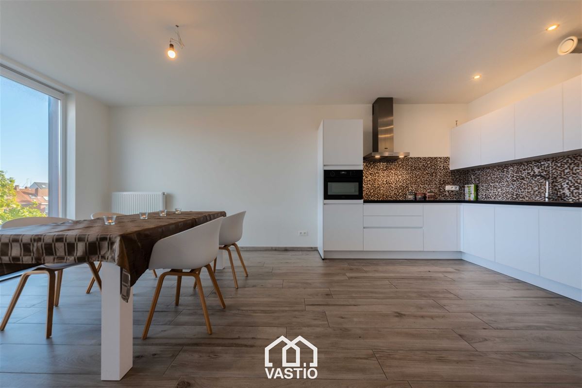 Energiezuinig appartement 2 slaapkamers en parkeerplaats.