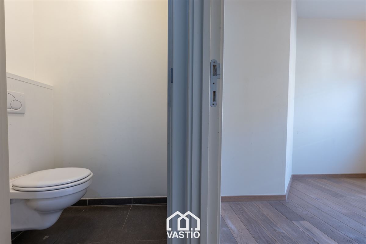 Gelijkvloers appartement met 2 slaapkamers en 2 badkamers