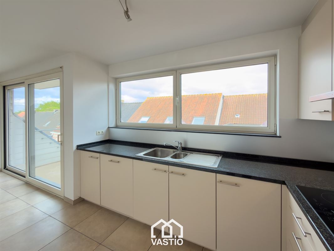 Penthouse met terras en garage in hartje Eeklo
