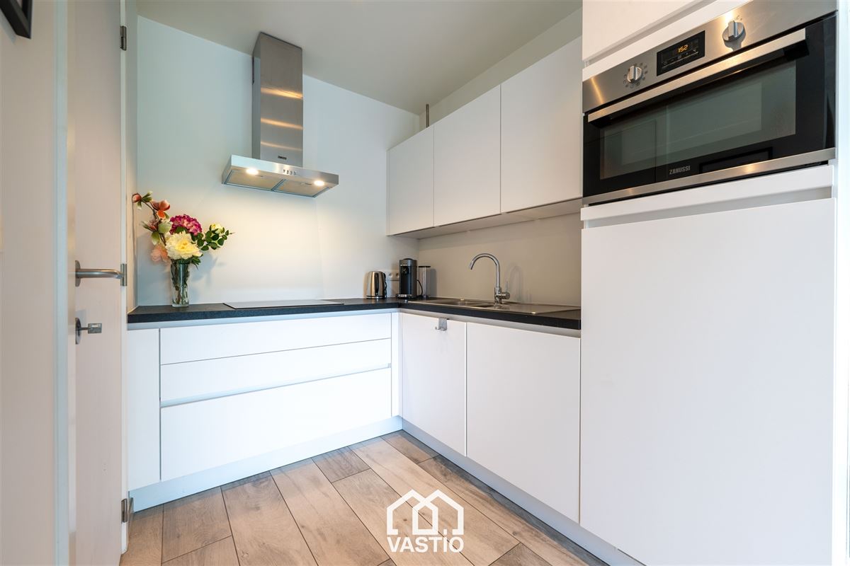 Instapklaar appartement met zicht op de oude Vismijn