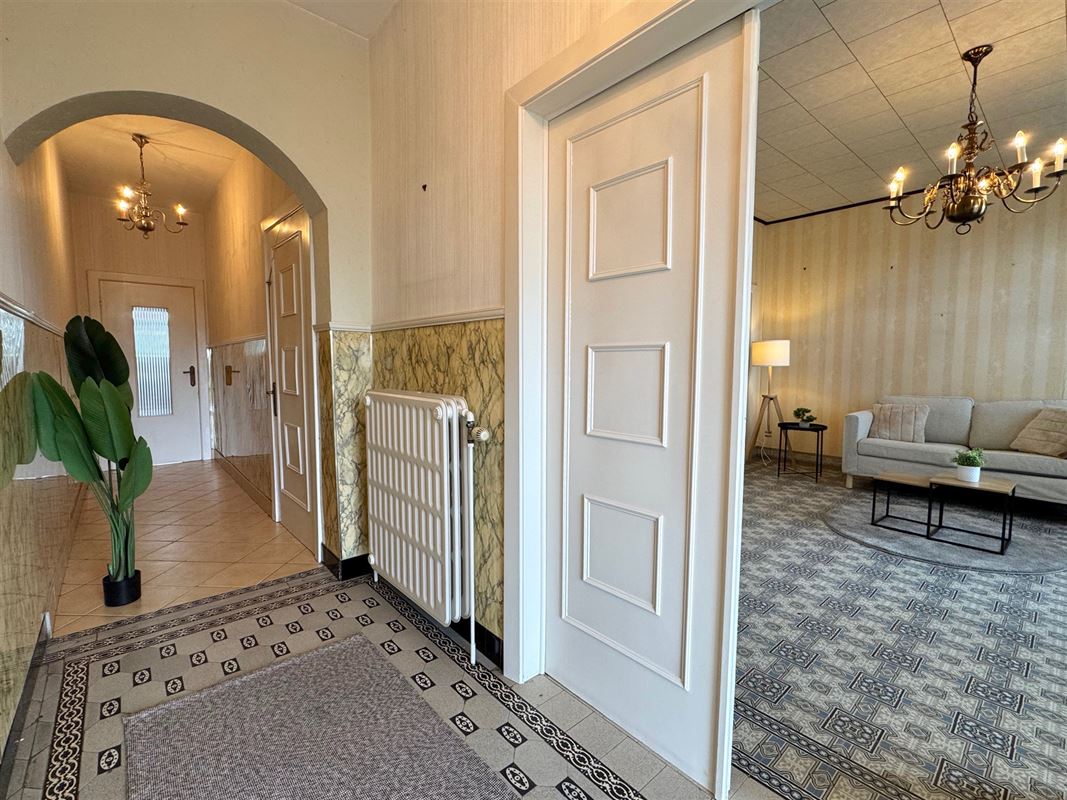 TE RENOVEREN WONING MET 4 SLPKS EN TUIN