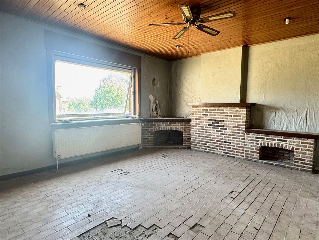MAISON A RÉNOVER AU CALME avec JARDIN et 2 GARAGES!