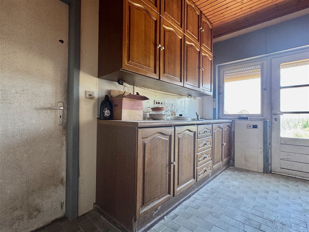 TE RENOVEREN WONING in het hart van LE PAYS DES COLLINES!