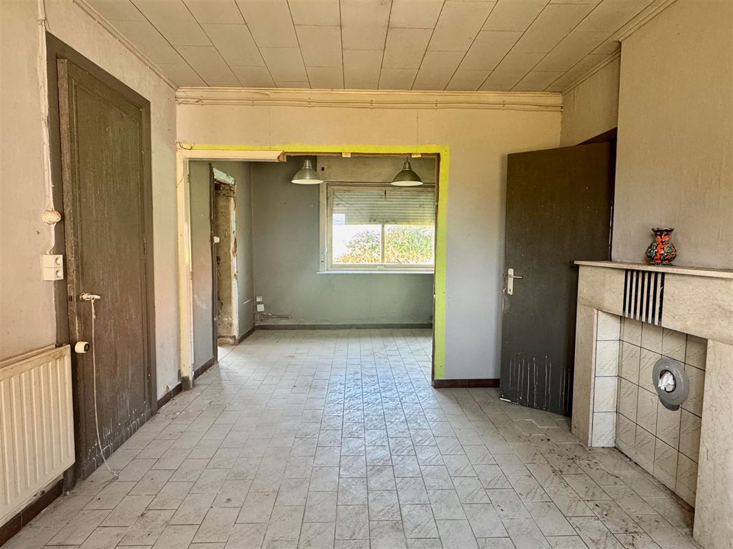 MAISON A RÉNOVER AU CALME avec JARDIN et 2 GARAGES!