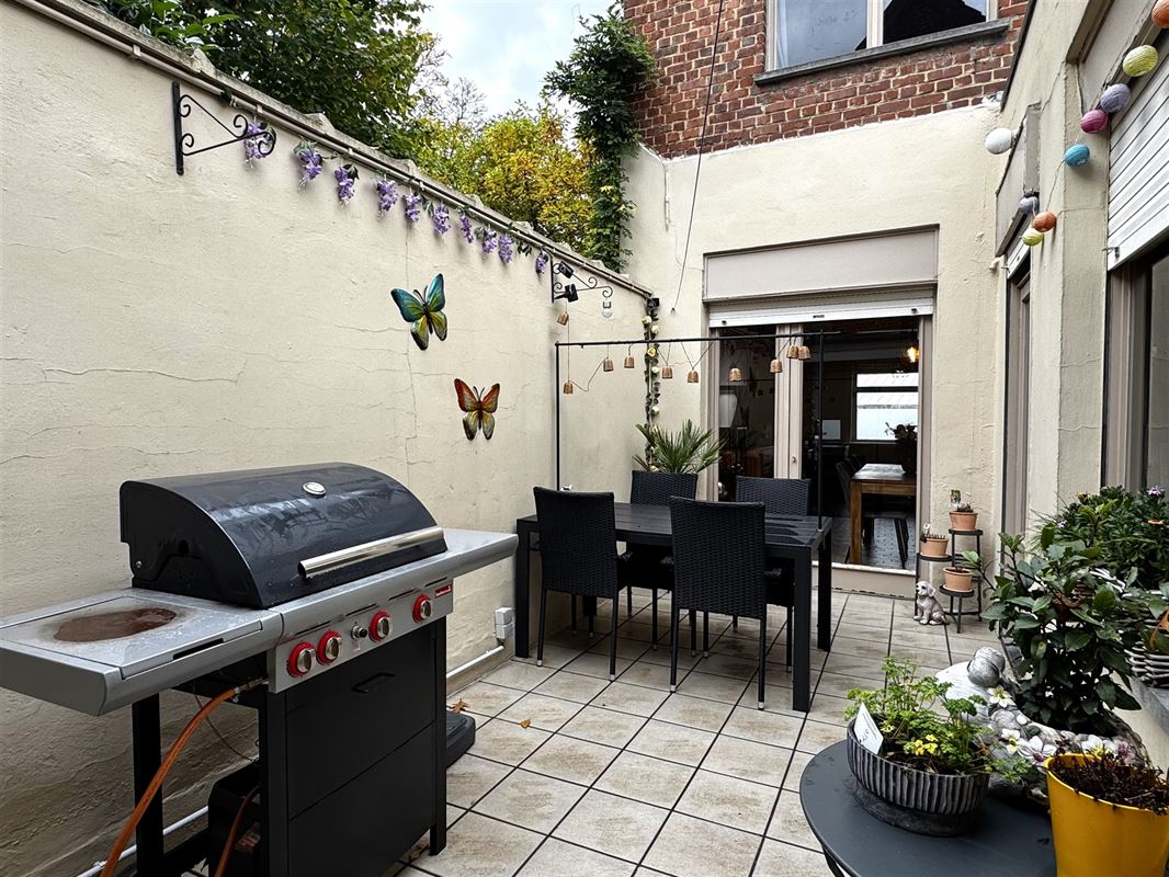 Spacieuse maison bien située avec jardin de ville.