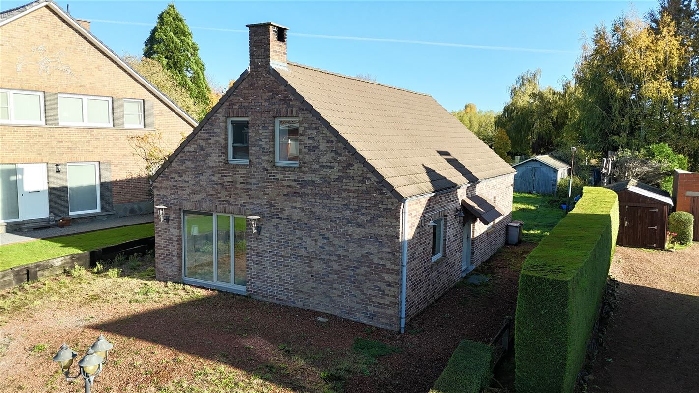 MAISON UNIFAMILIALE BIEN SITUÉE AVEC JARDIN et GARAGE!