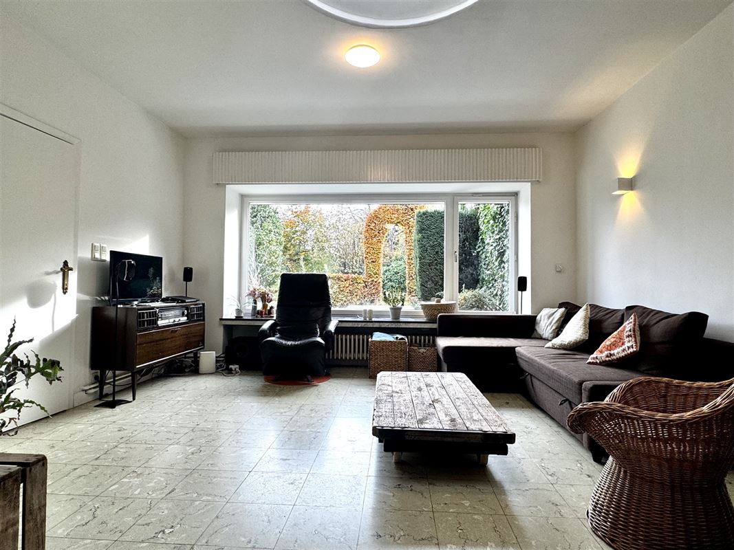 Rustig gelegen woning met 3 SLKS, garage en tuin.