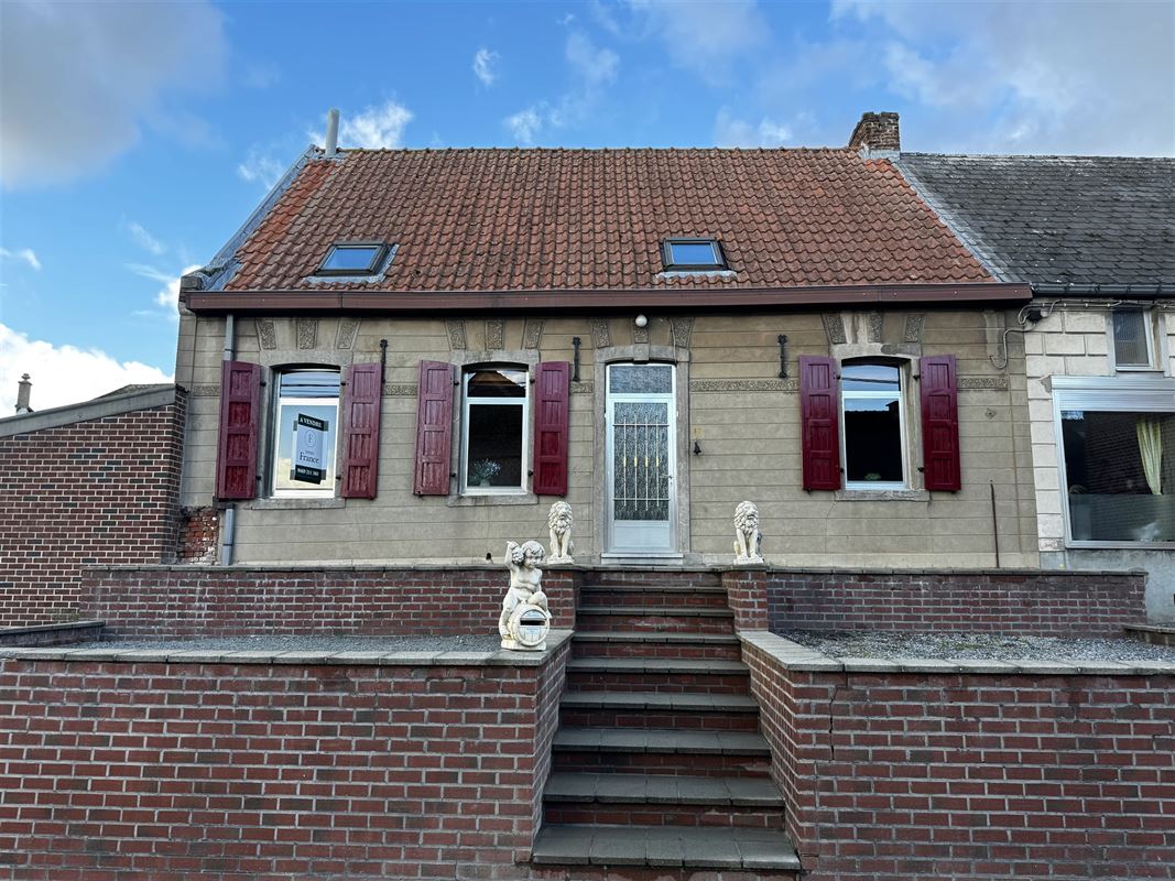 Charmante te renoveren woning met gezellige tuin!