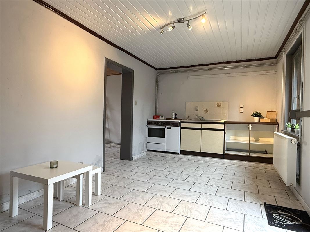 Charmante te renoveren woning met gezellige tuin!