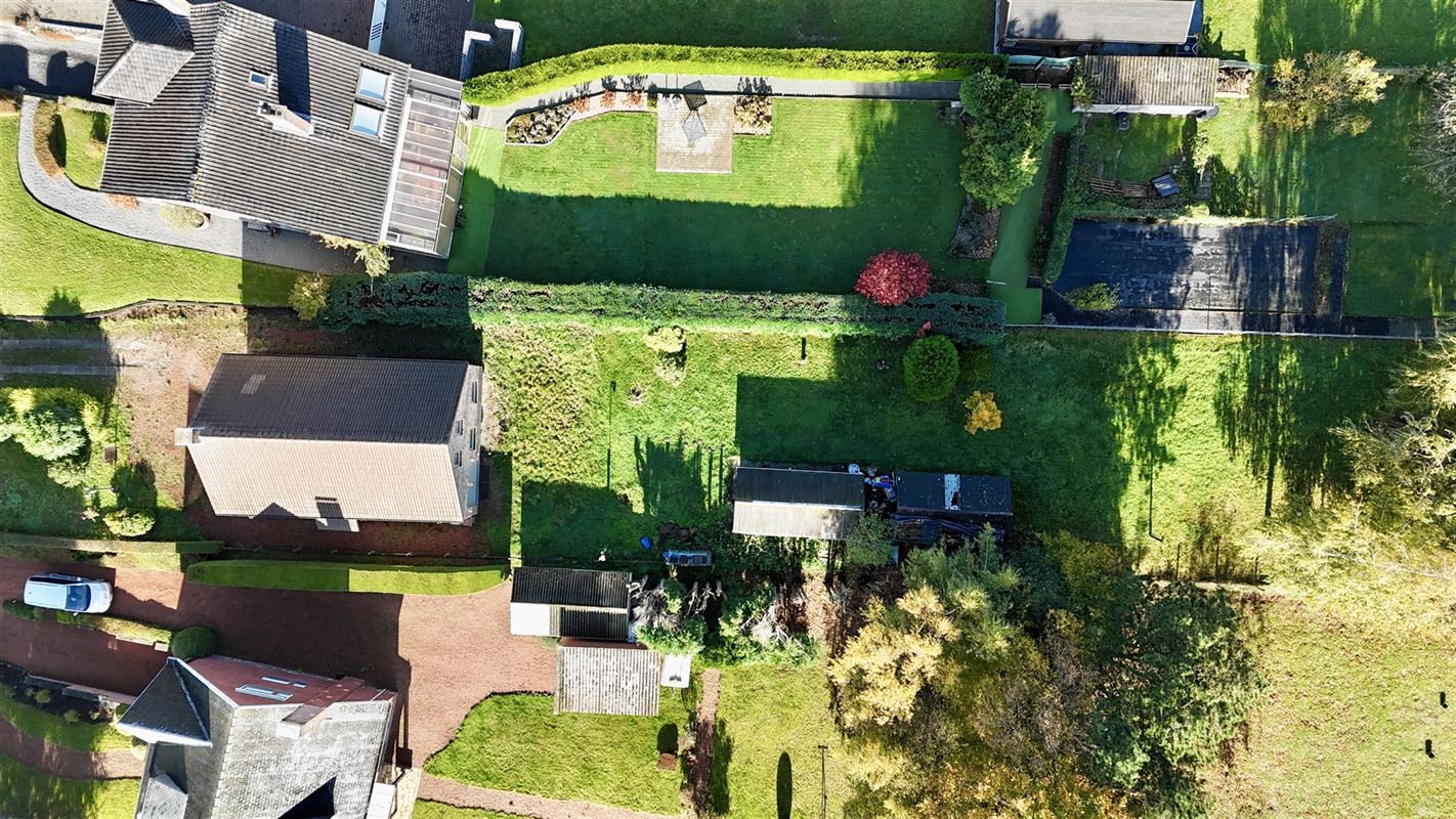 MAISON UNIFAMILIALE BIEN SITUÉE AVEC JARDIN et GARAGE!