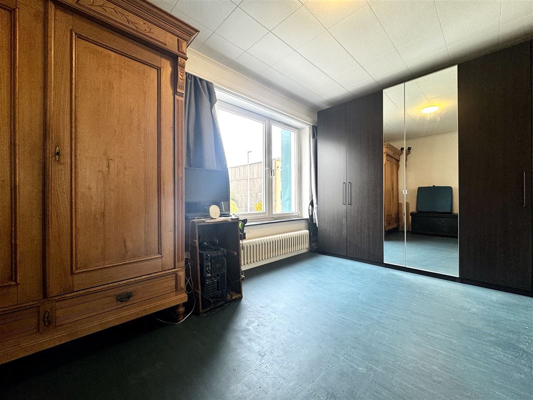 Rustig gelegen woning met 3 SLKS, garage en tuin.