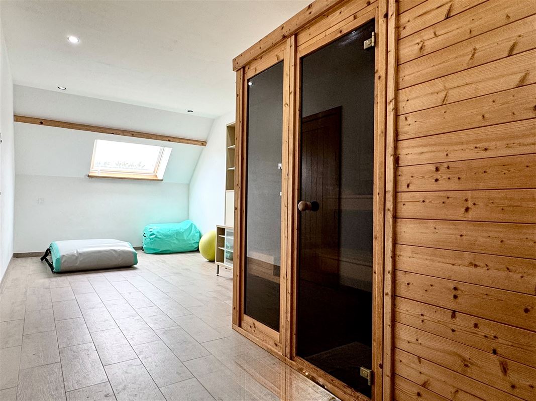 RUIME ENERGIEZUINIGE WONING MET ATELIER EN GARAGE!