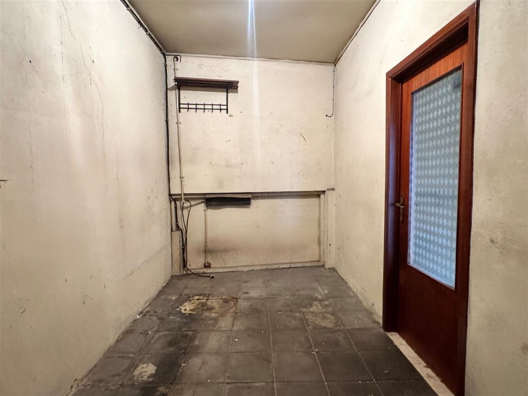 Degelijke rijwoning met garage en tuin!