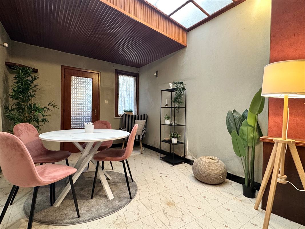 Degelijke rijwoning met garage en tuin!