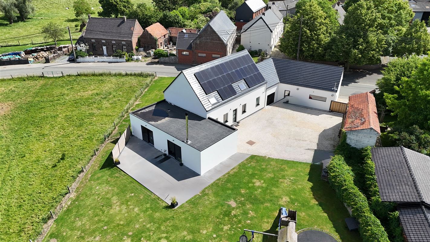 RUIME ENERGIEZUINIGE WONING MET ATELIER EN GARAGE!