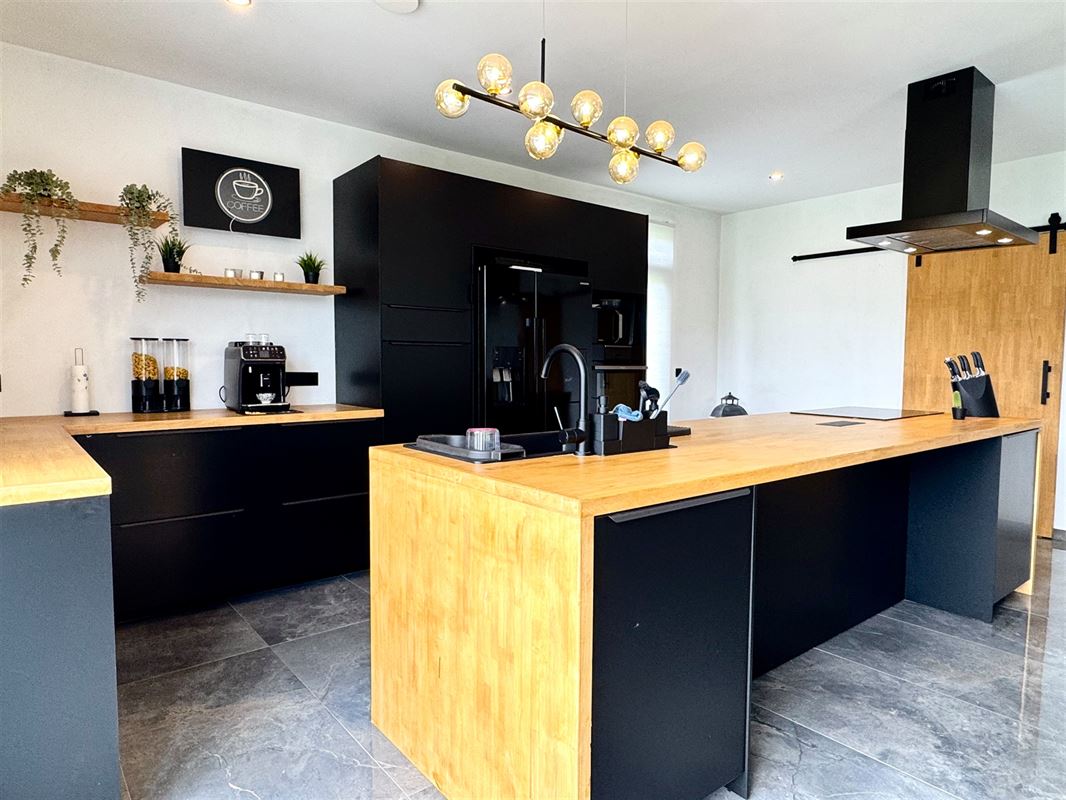 RUIME ENERGIEZUINIGE WONING MET ATELIER EN GARAGE!