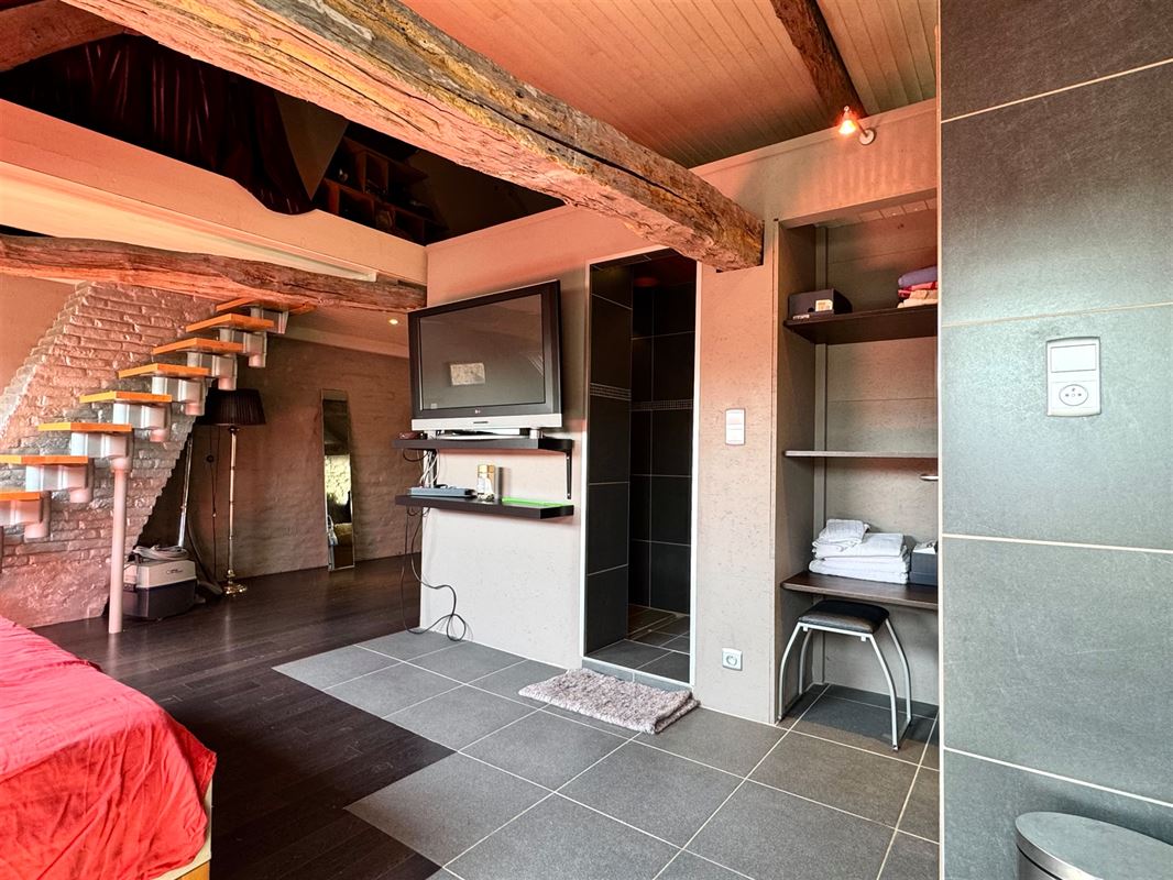 Immeuble à fort potentiel bénéficiant d’un emplacement commercial de premier choix au cœur de Renaix!