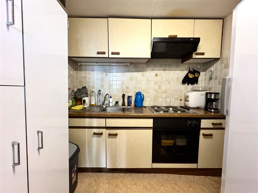 OPBRENGSTEIGENDOM – 2 APPARTEMENTEN – 5 GARAGES