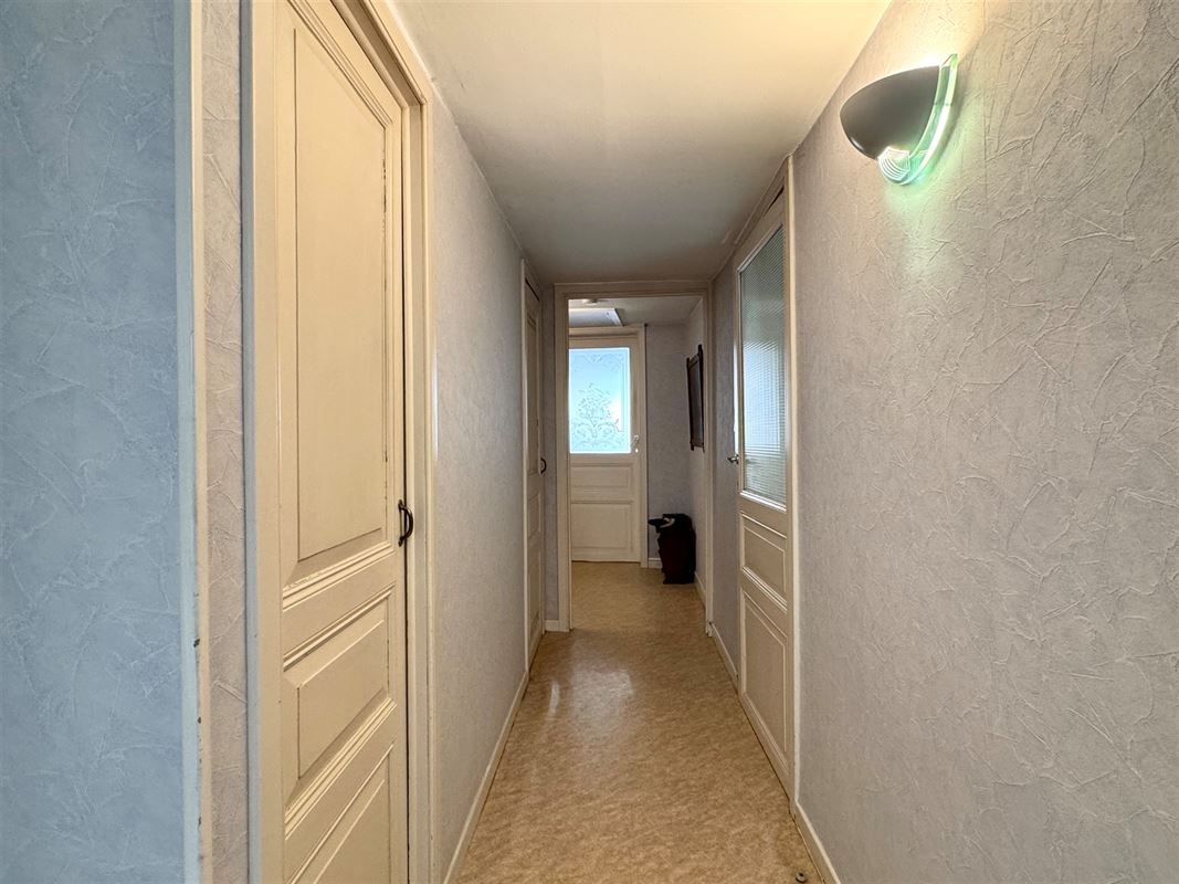 OPBRENGSTEIGENDOM – 2 APPARTEMENTEN – 5 GARAGES