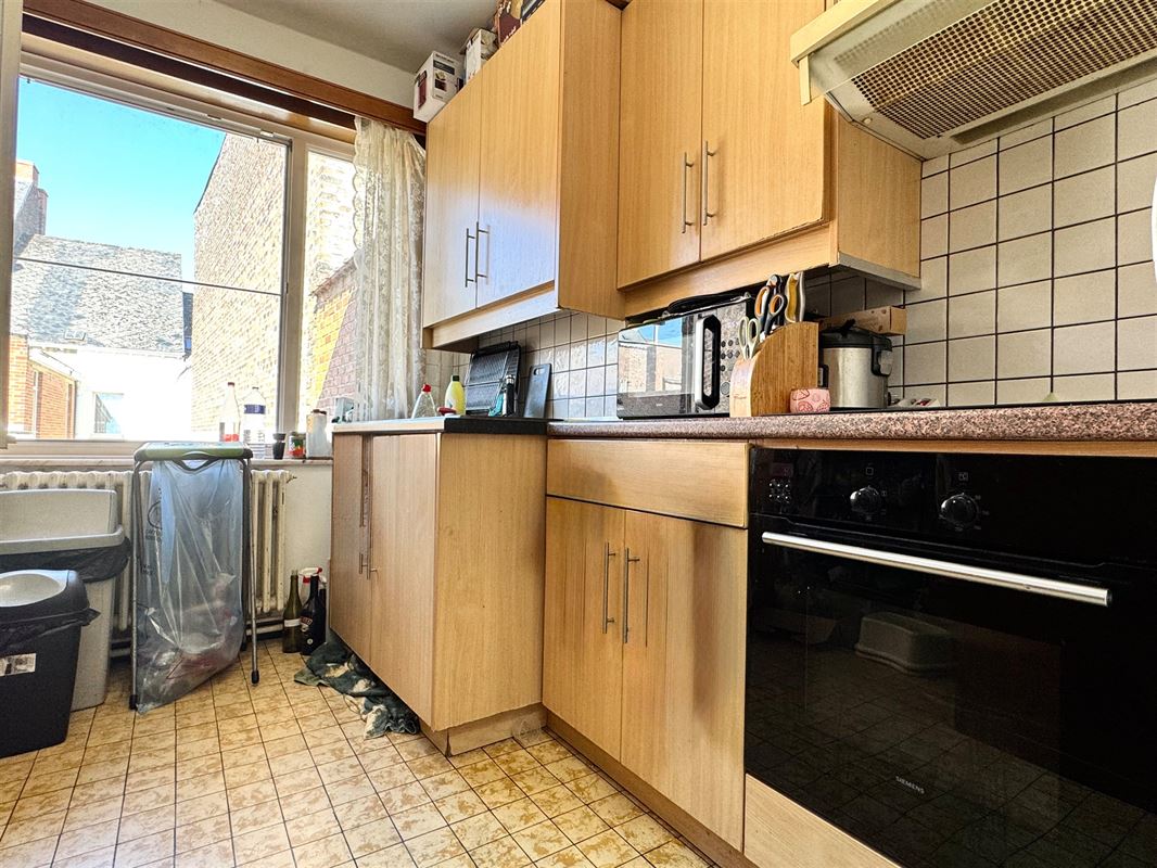 OPBRENGSTEIGENDOM – 2 APPARTEMENTEN – 5 GARAGES