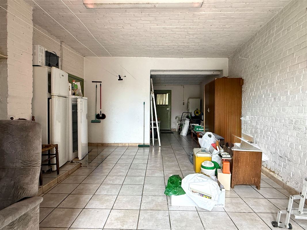 CHARMANTE WONING MET TUIN EN GARAGE OP 2.4OOm2