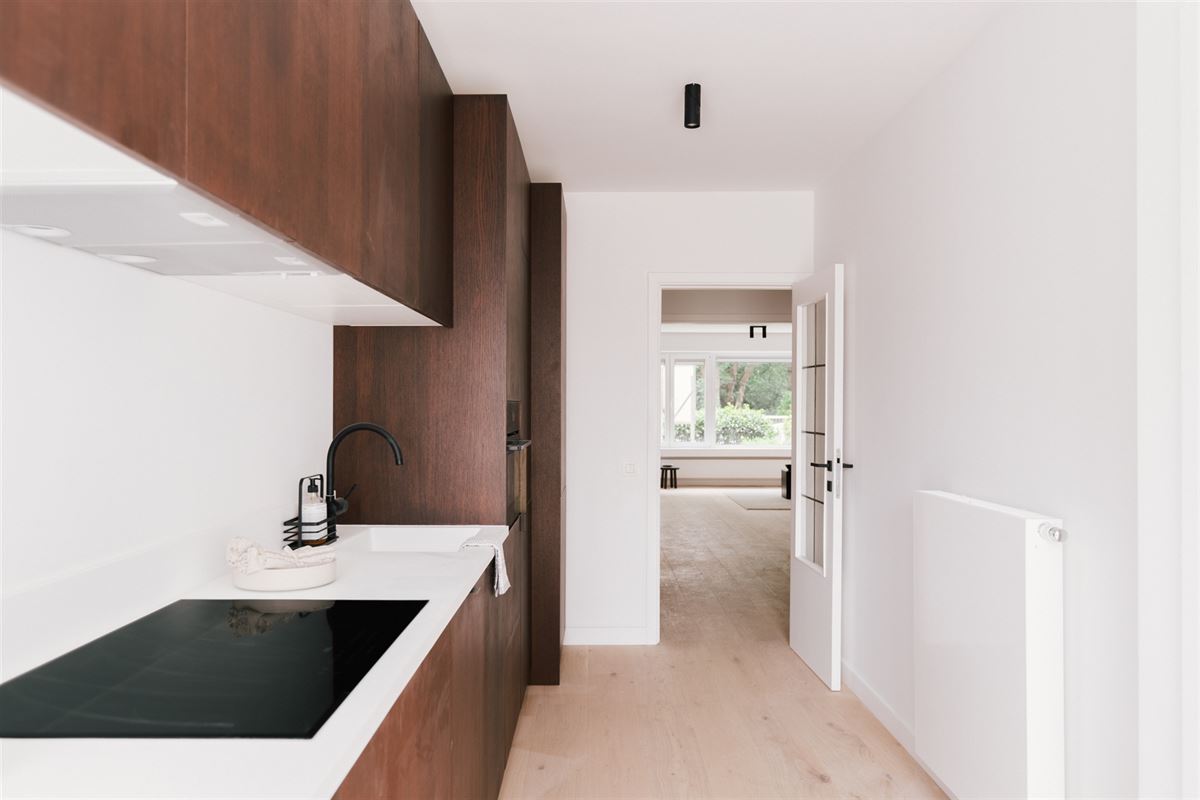 Prachtig gerenoveerd appartement met zonnige tuin